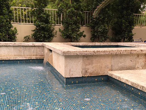 Antique Stone Pool Coping Slabs Milled at 2.5" in Thickness Installed in a pool and Jacuzzi in a Custom Home in Newport Beach